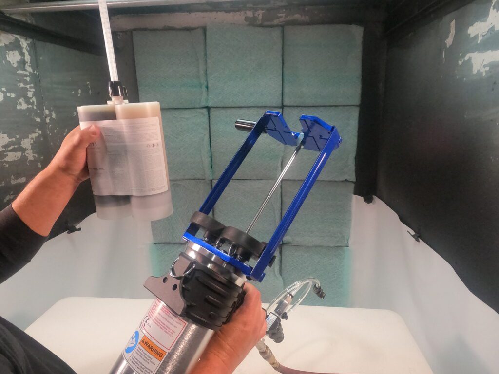 loading cartridge into qwik spray gun
